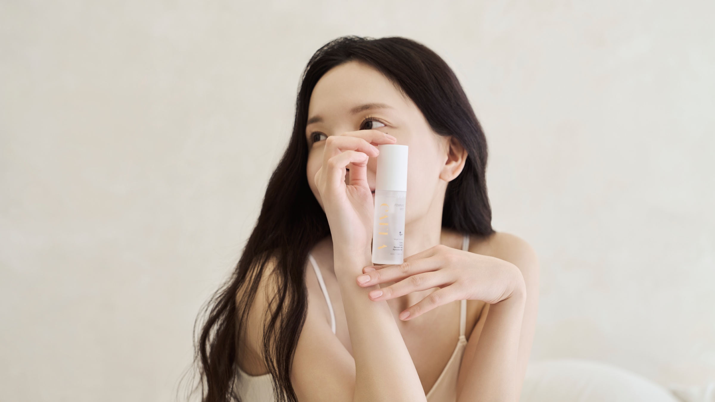 CAELA feminine mist held in a calm daily ritual